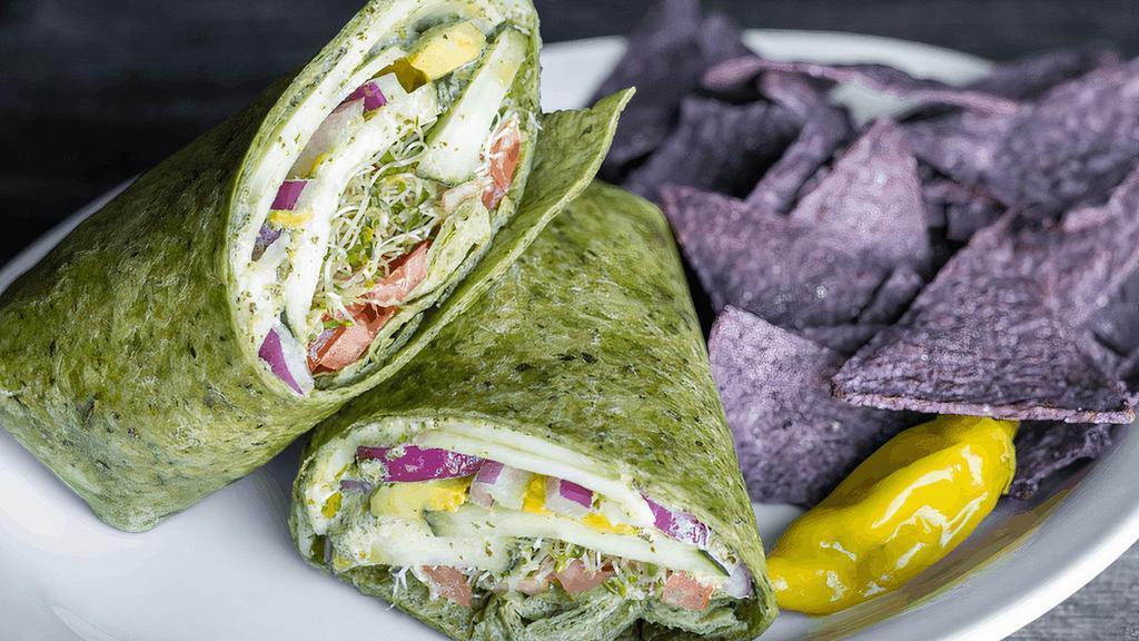 Green Horn Veggie Wrap · Avocado, tomatoes, cucumbers, sprouts, red onions, provolone & pesto mayo in a flour tortilla. Served with tortilla chips. (cal 1060)