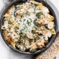 Baked Chicken Alfredo · 8-12 SERVINGS. Penne, alfredo sauce, chicken, roasted zucchini &. basil-ricotta, topped with...