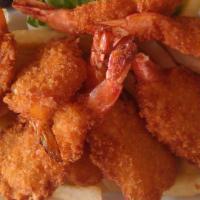 Jumbo Shrimp Basket · Crispy fan-tailed shrimp served with fries and cocktail sauce.
