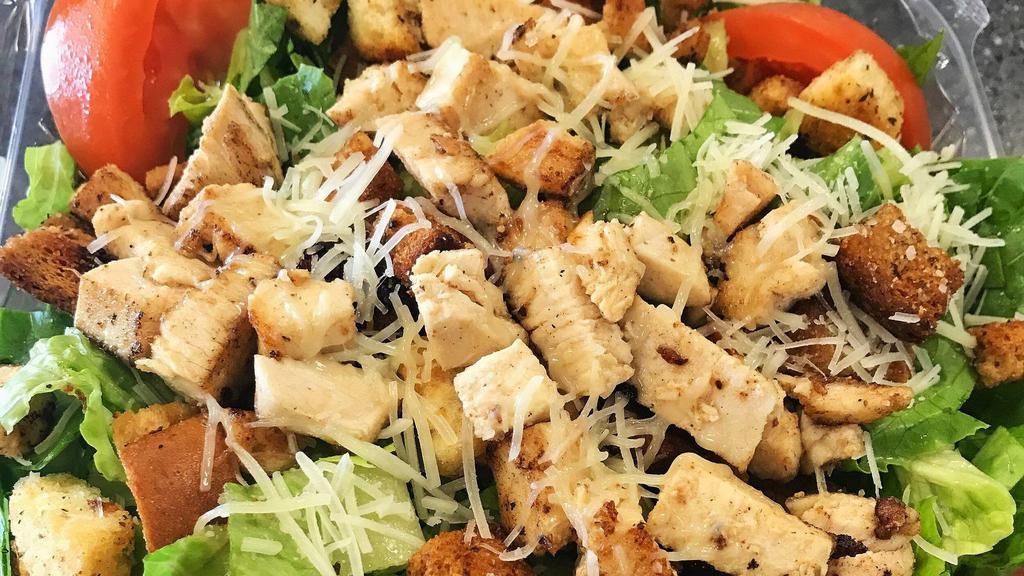 Chicken Caesar Salad · Grilled chicken, romaine lettuce, tomato, asiago cheese, croutons and creamy Caesar dressing.