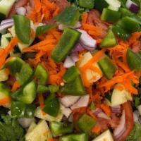 Garden Salad · Lettuce, tomato, onion, carrots, cucumbers and green peppers.