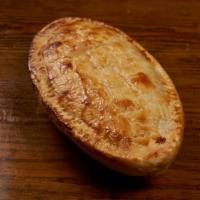 Chicken Pot Pie · Farm raised chicken, potatoes and carrots baked under a flaky crust.