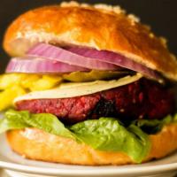 Veggie Burger · Our own fresh, savory vegetable patty on toasted onion bun. Comes with crispy seasoned fries...