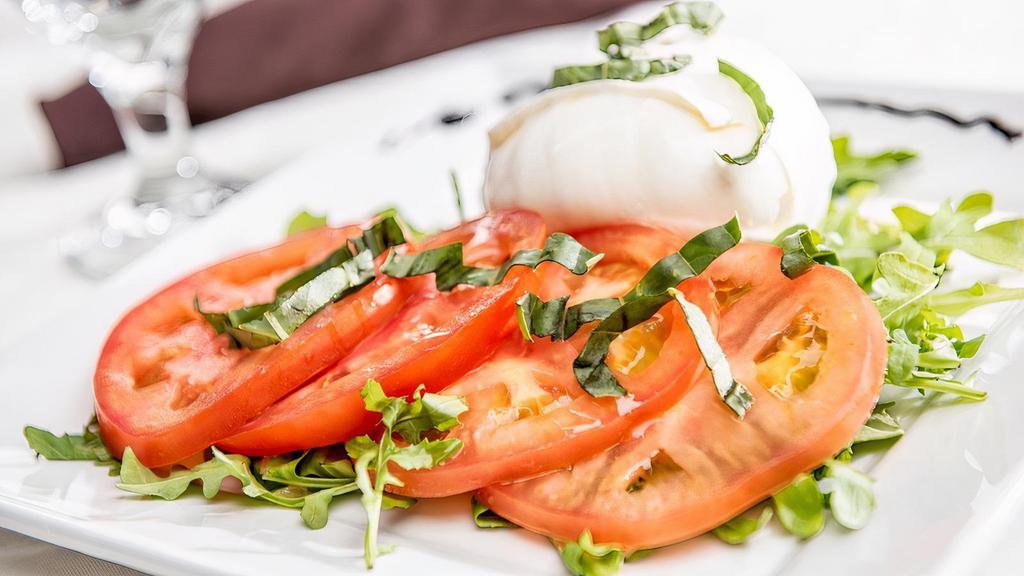 Caprese Di Bufala · Fresh Sliced Tomato, Buffalo Mozzarella, Basil & Extra Virgin Olive Oil