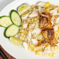 Signature Soft-Shell Crab Fried Rice · Crispy soft-shell crab meat, egg, onion.