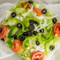 House Salad · Fresh mixed lettuce, tomatoes, red onions, cucumbers, carrots, green peppers, olives.