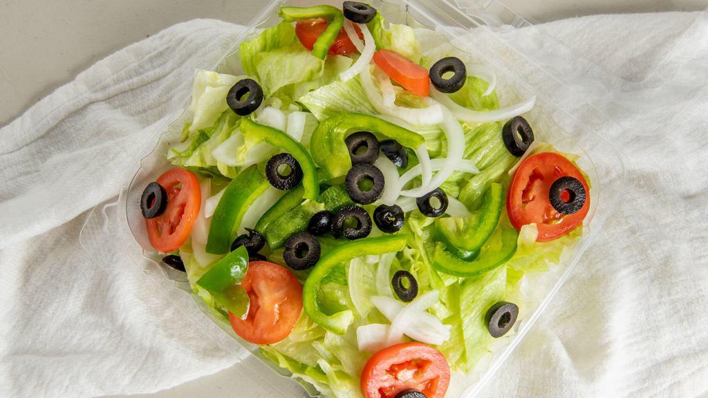 House Salad · Fresh mixed lettuce, tomatoes, red onions, cucumbers, carrots, green peppers, olives.