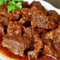 Carne De Res Guisada / Stewed Beef · Includes: Rice, Lettuce, Tomato
Incluye: Arroz, Lechuga, Tomate