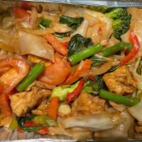 Simple Drunken Noodle  · Spicy. Udon noodles, onions, bell peppers, tomatoes, garlic, Thai basil, fresh chili, and cr...
