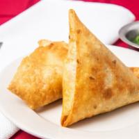 Lentil Sambusa (2 Pieces) · Spiced pastry filled with spiced lentil, onion garlic & cilantro.