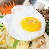 Seasoned Veggie Bibimbop (산채 비빔밥) · Steamed rice topped with seasoned vegetables. Served with Korean chili sauce.