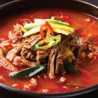 Spicy Beef Soup (육개장) · Beef brisket, vegetables, sweet potato noodles, and egg.