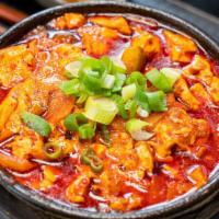 Spicy Seafood Soft Tofu Soup (해물 순두부 백반) · Shrimp, octopus, squid, clam, mussel, soft tofu, vegetables, and egg.