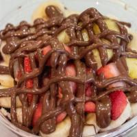 Nutella Bowl · Organic acai, topping: granola, banana, strawberry, pineapple and Nutella.