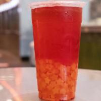 Strawberry Tea · Non-dairy fruit bubble tea served with tapioca,  juice popper or fruit jelly.