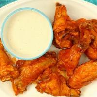 Buffalo Wings · Spicy. Eight pieces. With blue cheese.