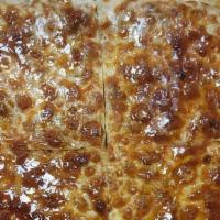 Detroit Cheese Pizza · san marzano tomatoes, mozzarella, white cheddar, provolone, sprinkled gouda