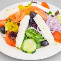 Mediterranean Salad · Mixed greens, feta cheese, olives, tomatoes, pepperoni, oil & vinegar.