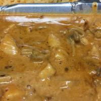 Chicken Chipotle · Chicken strips sautéed with onions and mushrooms in a creamy chipotle sauce served with rice...