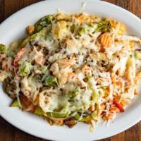 Mexican Stir Fry · Chicken breast sautéed with fresh vegetables on a bed of rice covered with jack cheese not s...