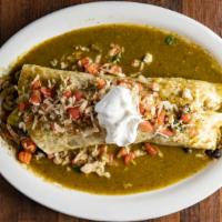 Pollo Asado Burrito · Large flour tortilla stuffed with grill chicken seasoning vegetables rice black beans topped...