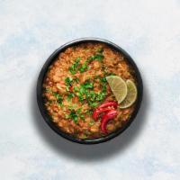 Baingan Bharta · Grilled eggplant minced and slowly cooked with tomatoes, onions and herbs. Served with a por...