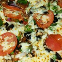 Greek Pizza · Mozzarella cheese, pesto sauce, spinach, fresh tomato slices,
green olives and feta cheese