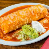 Fajita Burrito · Choice of grilled chicken, steak or shrimp. With grilled onions, bell peppers, black beans a...