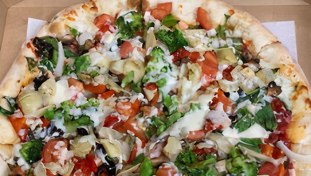 Veggie Supremo Pizza · Mushroom, tomato, onion, black olives, artichoke hearts, broccoli, garlic, spinach, and roasted red peppers.