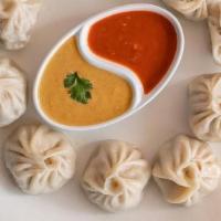 Steam Momo (8Pcs) · Delicious, freshly made steamed dumpling filling with chicken, vegetable, and spices served
...