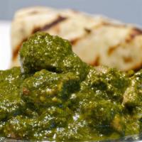 Chicken Saag/Spinach · Delicately spiced cooked in spinach lightly creamy herbs and spices.