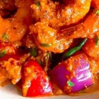 Shrimp Tikka Masala · Shrimp cooked with diced of onion, bell pepper in a creamy tomato-onion based gravy)