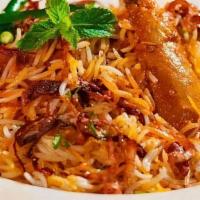 Chicken Biryani · A delightful combination of chicken, lamb, shrimps or veggie cooked with basmati rice, herbs...