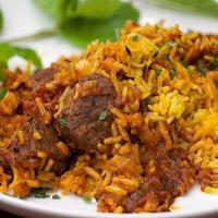 Lamb Biryani · A delightful combination of chicken, lamb, shrimps or veggie cooked with basmati rice, herbs...