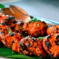 Chicken Tikka · BBQ boneless cubes of chicken breast marinated with herb and spices