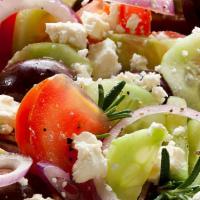 Greek Salad · Fresh salad mix, tomato, cucumber, red onion, feta cheese, kalamata olives and pepperoncini.