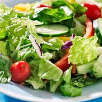 Tossed Salad · Fresh salad mix, tomato, cucumber, and red onion.