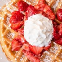 Belgian Waffle · Belgian waffle with choice of bacon, sausage or scrapple. With turkey bacon or turkey sausag...