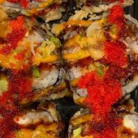 Fancy Roll (Deep Fried) · Spicy Salmon, Cream cheese, Avocado deep fried scallion, tobiko on top with honey wasabi sau...