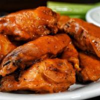 Lunch Buffalo Wings · 10 wings, blue cheese dressing, and celery.