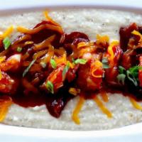 Lunch Shrimp And Grits · Jalapeno cheddar grits, citrus bbq sauce, bacon and green onions.