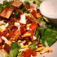 Dinner Jake'S Salad · Lettuce mix, bacon, jack, and cheddar, tomatoes, green onions, croutons, and choice of dress...