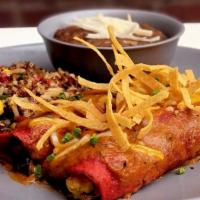 Brunchiladas · Roasted Brussels Sprouts, Medley of Potatoes, Maple Dijon sauce, Red Corn, Ranchero Sauce, S...