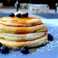 Gluten-Free Pancakes  · Fluffy Gluten-Free Pancakes, FYH Butter, Fresh Fruit, Maple Syrup