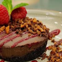 Chocolate Cheesecake · A chocolate version of our hibiscus cheese cake, with a mixed berry compote, & Belse cookie ...