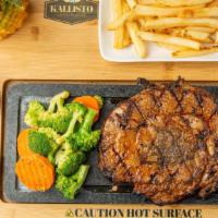 Rib-Eye Steak · Marinated, fire-grilled 14 oz rib-eye steak served with one sauce of your choice, white mush...