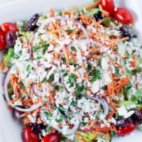 Greek Salad · Romaine lettuce, cucumber, pickled carrots, red onions, grape tomatoes, kalamata olives*, fe...