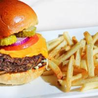 Angus Cheddar Burger Entree · Angus beef patty, cheddar, iceberg lettuce, tomato, red onion and pickles on a brioche bun. ...