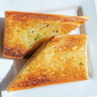 Single Side Garlic Bread · Fresh ciabatta toasted with house made garlic butter and parsley (Vegetarian)