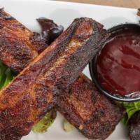St Louis Rib Appetizer · Gluten free. Dry-rubbed and smoked over pecan wood for six hours, 1/3 rack of meaty ribs are...